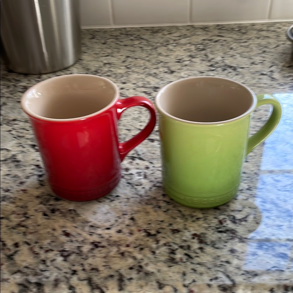 Two le creuset mugs